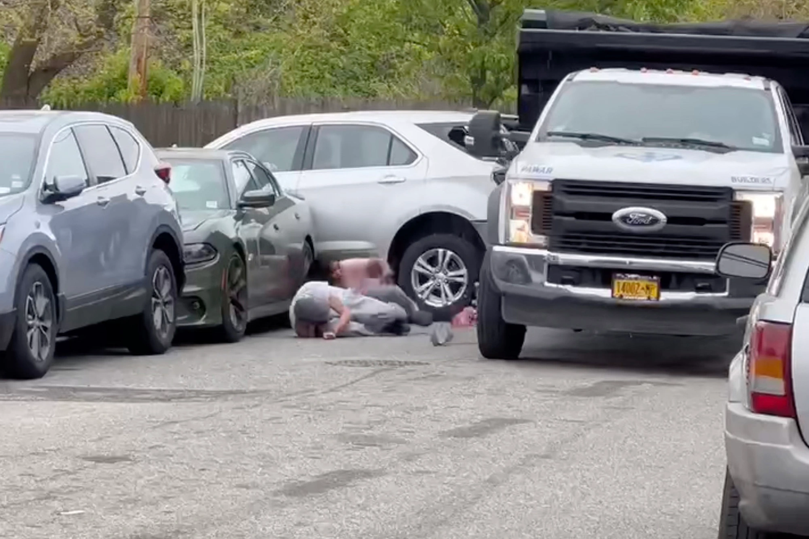 Pedestrian Gets Pinned Between Two Vehicles